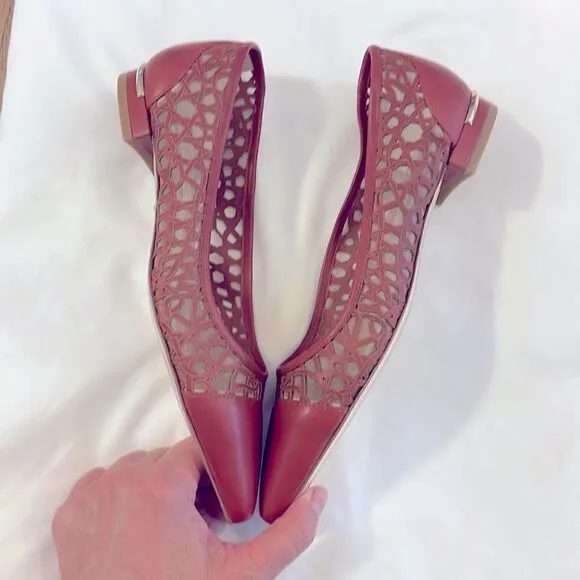 EMY MACK RUST COLORED CUT OUT FLATS.  NICELY PADDED.  NEW IN BOX