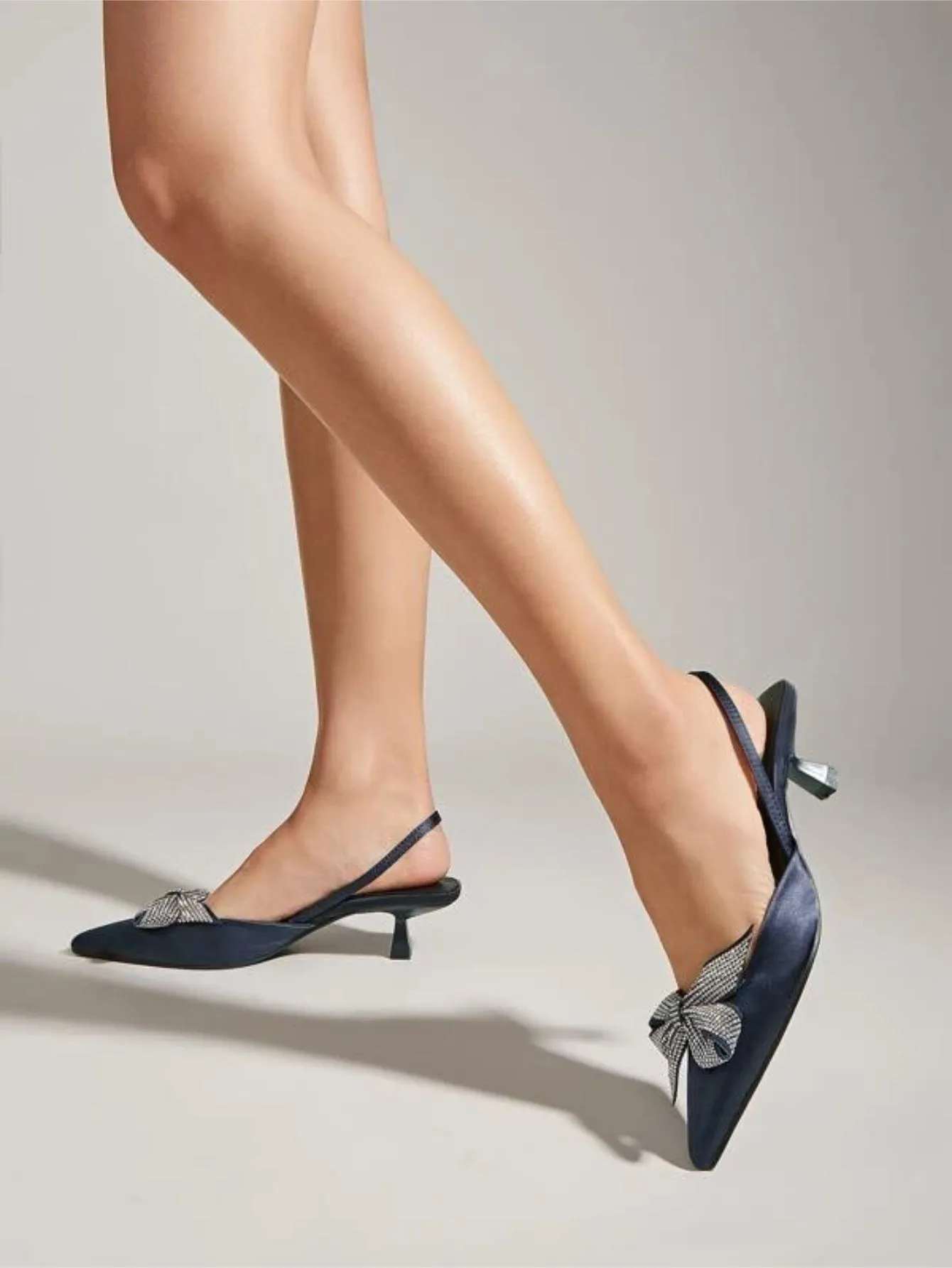 Slingback Pumps With Rhinestone Bow